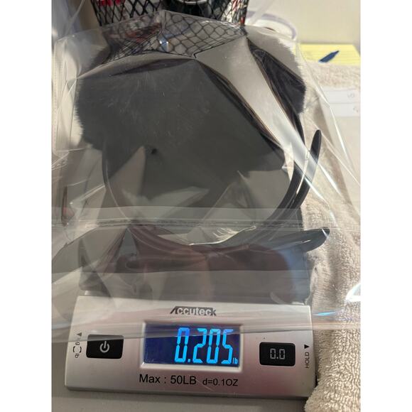 Kate Spade New York Shoelace Bow Faux Fur Earmuffs - Picture 7 of 7